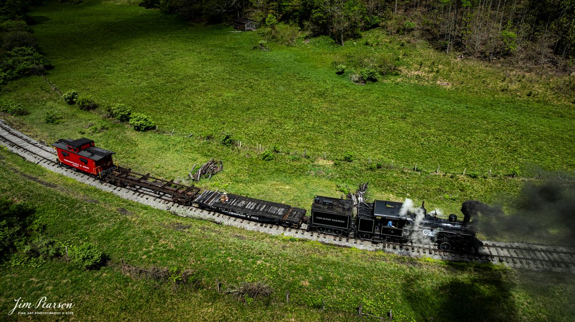 Cass Scenic Railroad Heisler #6 pulls through the countryside just past milepost 92 on the way to Durban, West Virginia, during the Cass Spring Photographers Special, out of Cass, West Virginia on May 4th, 2025. 

According to the Mountain Rail West Virginia Website: The Meadow River Lumber No. 6 was built by the Heisler Locomotive Works in Erie, PA, in 1929 for the Bostonia Coal & Clay Products Company of New Bethlehem, PA.

The Heisler was sold to the Meadow River Lumber Company at Rainelle, WV in 1939, where it was rostered as No. 6. She retired from the lumber company in 1965 and was purchased by the purchased it by the state of West Virginia purchased. The engine ran under its own steam from Rainelle to its new home in Cass in December 1966. No. 6 would begin operating on the railroad in 1968. The Heisler is the fastest geared locomotive in the Cass collection.

Tech Info: DJI Mavic 3 Classic Drone, RAW, 24mm, f/2.8, 1/1600, ISO 100.

#railroad #railroads #train, #trains #railway #railway #steamtrains #railtransport #railroadengines #picturesoftrains #picturesofrailways #besttrainphotograph #bestphoto #photographyoftrains #bestsoldpicture #JimPearsonPhotography #trainsfromtheair #trainsfromadrone #steamtrain #casssenicrailroad