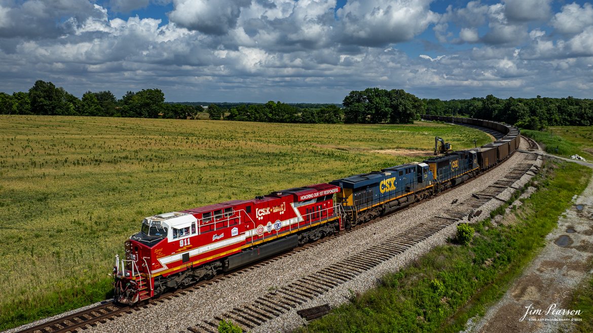 CSXT 911, Honoring our First Responders locomotive, leads empty coal train E305 as they pass through the curve at Breton, Kentucky on their way north on June 5th, 2025, on the CSX Henderson Subdivision. 

There used to be a siding at this location, but it was decommissioned a few months ago as it was too short to be of use these days. As you can tell, crews have started pulling up the rail.

CSXT 911 is painted in vibrant red with white and gold striped accents along with the logo of program partners First Responders Children’s Foundation and Operation Gratitude. It also features generic police, fire and emergency medical services logos.

Tech Info: DJI Mavic 3 Classic Drone, RAW, 24mm, f/2.8, 1/2500, ISO 100.

#railroad #railroads #train, #trains #railway #railway #steamtrains #railtransport #railroadengines #picturesoftrains #picturesofrailways #besttrainphotograph #bestphoto #photographyoftrains #bestsoldpicture #JimPearsonPhotography #Brightline #passengertrains #trainsfromtheair #trainsfromadrone