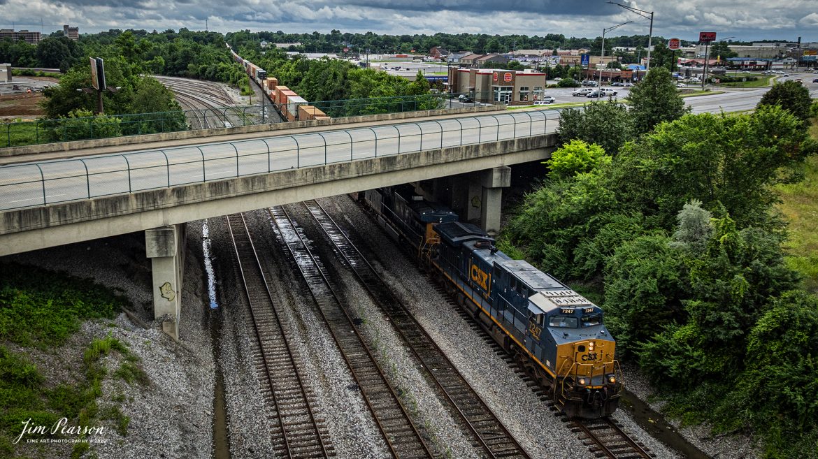 CSXT 7247 leads hot intermodal I128 northbound under the Island Ford Road overpass at Madisonville, Kentucky on June 14th, 2025, on the CSX Henderson Subdivision.

Tech Info: DJI Mavic 3 Classic Drone, RAW, 24mm, f/2.8, 1/3200, ISO 280.

#railroad #railroads #train, #trains #railway #railway #steamtrains #railtransport #railroadengines #picturesoftrains #picturesofrailways #besttrainphotograph #bestphoto #photographyoftrains #bestsoldpicture #JimPearsonPhotography #trainsfromtheair #trainsfromadrone #csxhendersonsubdivision #onecsx