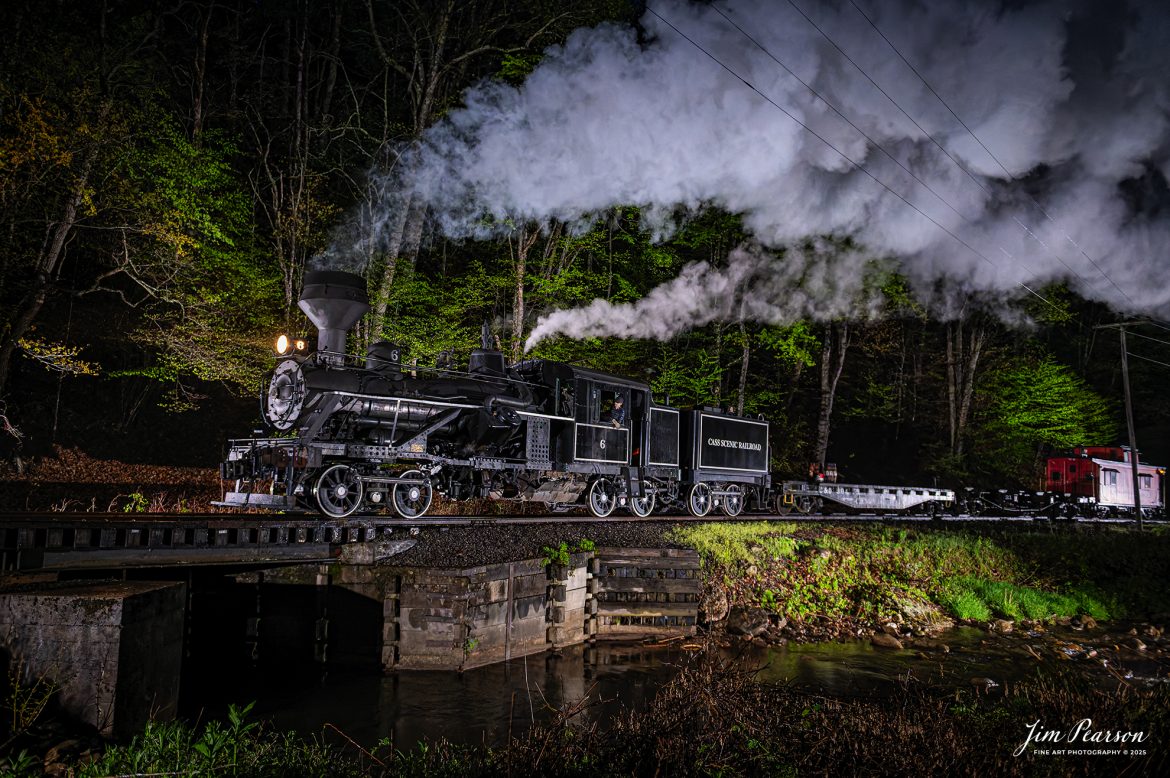Cass Scenic Railroad Heisler #6 pulls across the bridge in a light rain at Leatherbark Creek during a night photo shoot as part of the Cass Spring Photographers Special, at Cass, West Virginia on May 3rd, 2025. 

According to the Mountain Rail West Virginia Website: The Meadow River Lumber No. 6 was built by the Heisler Locomotive Works in Erie, PA, in 1929 for the Bostonia Coal & Clay Products Company of New Bethlehem, PA.

The Heisler was sold to the Meadow River Lumber Company at Rainelle, WV in 1939, where it was rostered as No. 6. She retired from the lumber company in 1965 and was purchased by the purchased it by the state of West Virginia purchased. The engine ran under its own steam from Rainelle to its new home in Cass in December 1966. No. 6 would begin operating on the railroad in 1968. The Heisler is the fastest geared locomotive in the Cass collection.

Tech Info: Nikon Z6ii, RAW, Nikon 24-70 @ 24mm, f/2.8, 1/160, ISO 10,000.

#railroad #railroads #train, #trains #railway #railway #railtransport #railroadengines #picturesoftrains #picturesofrailways #besttrainphotograph #bestphoto #photographyoftrains #bestsoldpicture #JimPearsonPhotography #steamtrain #casssenicrailroad