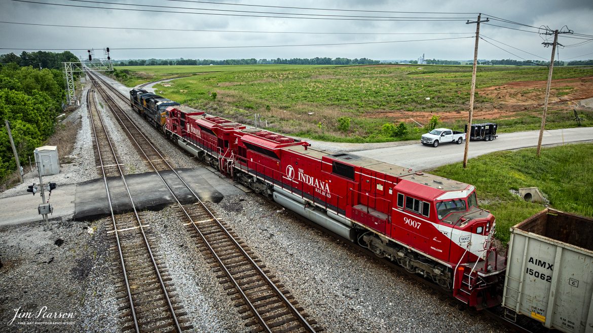 CSXT 5473 leads CSX M513 as it heads south out of Casky Yard at Hopkinsville, Ky, on May 9th, 2025, on the CSX Henderson Subdivision.

This train had Indiana Railroad 9012 and 9007 dead in tow as the trailing units. I’m told both engines were on their way to Memphis, Tennessee where they will be scrapped. Both units are SD90MACs.

Tech Info: DJI Mavic 3 Classic Drone, RAW, 22mm, f/2.8, 1/1250, ISO 140.

#trainphotography #railroadphotography #trains #railways #trainphotographer #railroadphotographer #jimpearsonphotography #Indianarailroad #inrd