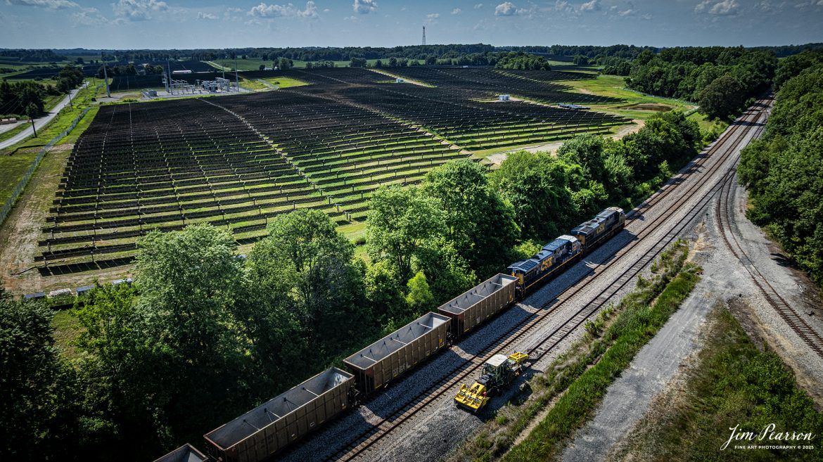 CSX empty coal train E319 heads north at Anaconda, just south of Robards, Kentucky as they pass the newly constructed Solar energy fields, on the CSX Henderson Subdivision, on July 11th, 2025. 

Tech Info: DJI Mavic 3 Classic Drone, RAW, 22mm, f/2.8, 1/2500, ISO 180.

#railroad #railroads #train, #trains #railway #railway #steamtrains #railtransport #railroadengines #picturesoftrains #picturesofrailways #besttrainphotograph #bestphoto #photographyoftrains #bestsoldpicture #JimPearsonPhotography #trainsfromtheair #trainsfromadrone