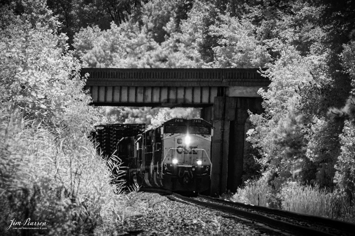 In this week’s Saturday Infrared photo, we catch a CSX 7418 leading CSX M512 with a long string of truck frames, as they pass under the US 41 overpass at Mortons Gap, Ky on their way north on the CSX Henderson Subdivision, on August 7th, 2025.

Tech Info: Fuji XT-1, RAW, Converted to 720nm B&W IR, Nikon 70-300 @ 200mm, f/5.6, 1/2000, ISO 400.

#trainphotography #railroadphotography #trains #railways #jimpearsonphotography #infraredtrainphotography #infraredphotography #trainphotographer #railroadphotographer #infaredtrainphotography #trending