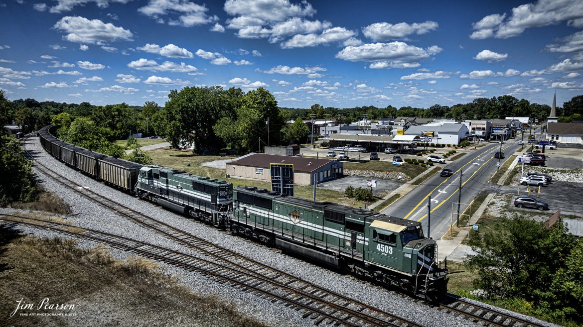 Paducah and Louisville Railway 4503 and 4521 lead a loaded Louisville, Gas and Electric coal train north at Central City, Kentucky, on August 26th, 2025. 

According to Wikipedia: The Paducah & Louisville Railway (reporting mark PAL) is a Class II railroad that operates freight service between Paducah and Louisville, Kentucky. The line is located entirely within the Commonwealth of Kentucky.

The 270-mile (430 km) line was purchased from Illinois Central Gulf Railroad in August of 1986.

Tech Info: DJI Mavic 3 Classic Drone, RAW, 22mm, f/2.8, 1/4000, ISO 250

#railroad #railroads #train, #trains #railway #railway #steamtrains #railtransport #railroadengines #picturesoftrains #picturesofrailways #besttrainphotograph #bestphoto #photographyoftrains #bestsoldpicture #JimPearsonPhotography #trainsfromtheair #trainsfromadrone #paducahandlouisvillerailway