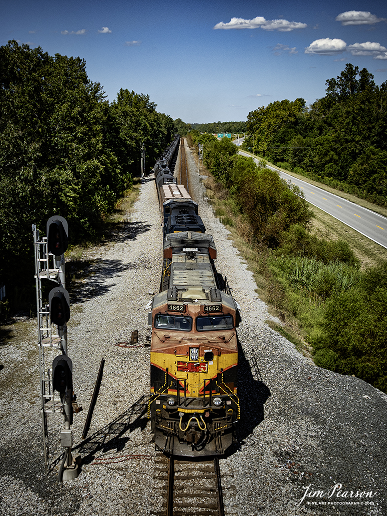 Kansas City Southern 4662 leads a loaded ethanol train B647 southbound as it passes the signals at Romney, just south of Nortonville, Kentucky on September 1st, 2025, on the CSX Henderson Subdivision.

Tech Info: DJI Mavic 3 Classic Drone, RAW, 22mm, f/2.8, 1/2000, ISO 340

#railroad #railroads #train, #trains #railway #railway #steamtrains #railtransport #railroadengines #picturesoftrains #picturesofrailways #besttrainphotograph #bestphoto #photographyoftrains #bestsoldpicture #JimPearsonPhotography #trainsfromtheair #trainsfromadrone #onecsx #csx #kcs