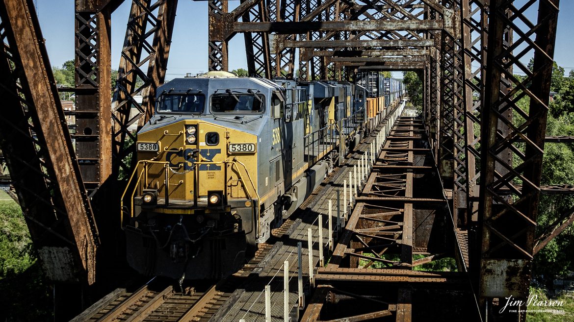 CSXT 5380 leads intermodal I128 north across the bridge over the Ohio River at Henderson, Kentucky on September 8th, 2025, on the CSX Henderson Subdivision.

Tech Info: DJI Mavic 3 Classic Drone, RAW, 22mm, f/2.8, 1/1250, ISO 110

#railroad #railroads #train, #trains #railway #railway #railtransport #railroadengines #picturesoftrains #picturesofrailways #besttrainphotograph #bestphoto #photographyoftrains #bestsoldpicture #JimPearsonPhotography #trainsfromtheair #trainsfromadrone #onecsx #csx