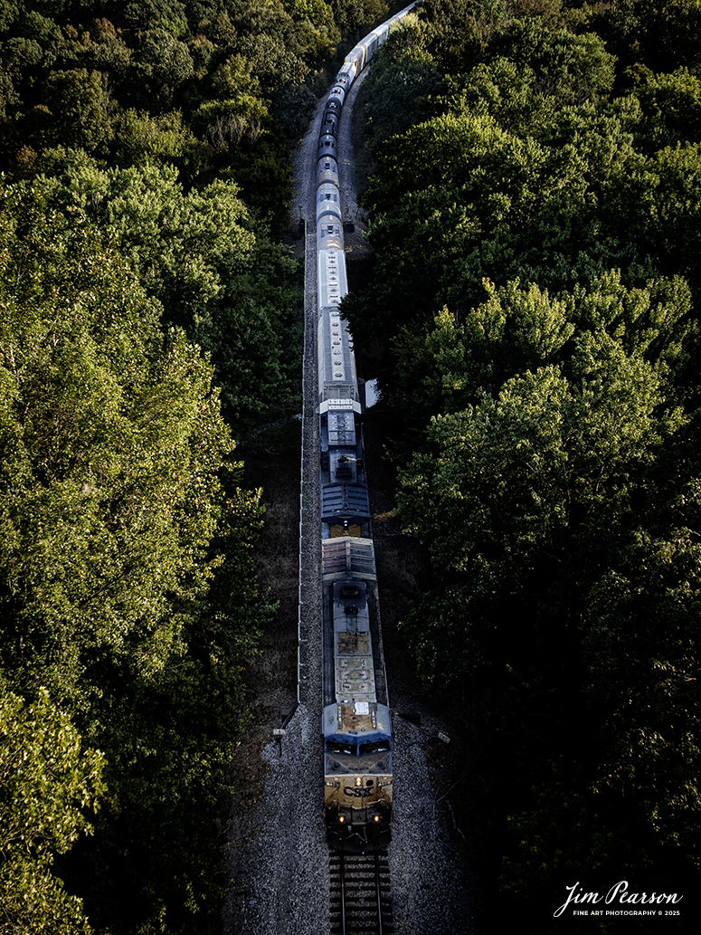CSXT 130 leads M500 over the Green River just north of Breton, Kentucky as they head north on September 9th, 2025, on the CSX Henderson Subdivision.

Tech Info: DJI Mavic 3 Classic Drone, RAW, 22mm, f/2.8, 1/500, ISO 100

#railroad #railroads #train, #trains #railway #railway #railtransport #railroadengines #picturesoftrains #picturesofrailways #besttrainphotograph #bestphoto #photographyoftrains #bestsoldpicture #JimPearsonPhotography #trainsfromtheair #trainsfromadrone #onecsx #csx