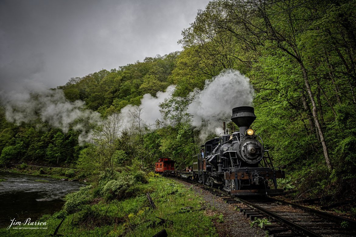 Engineer Noah Barkley keeps a watchful eye on the track ahead from Cass Scenic Railway Heisler #6 as they pull through the countryside at Wanless along the Greenbrier River, on the way to Durban, West Virginia, during the Cass Spring Photographers Special, from Cass, West Virginia on May 4th, 2025. 

According to the Mountain Rail West Virginia Website: The Meadow River Lumber No. 6 was built by the Heisler Locomotive Works in Erie, PA, in 1929 for the Bostonia Coal & Clay Products Company of New Bethlehem, PA.

The Heisler was sold to the Meadow River Lumber Company at Rainelle, WV in 1939, where it was rostered as No. 6. She retired from the lumber company in 1965 and was purchased by the purchased it by the state of West Virginia purchased. The engine ran under its own steam from Rainelle to its new home in Cass in December 1966. No. 6 would begin operating on the railroad in 1968. The Heisler is the fastest geared locomotive in the Cass collection.

Tech Info: Nikon Z6ii, RAW, Nikon 24-70 @ 24mm, f/7.1, 1/200, ISO 200.

#railroad #railroads #train, #trains #railway #railway #railtransport #railroadengines #picturesoftrains #picturesofrailways #besttrainphotograph #bestphoto #photographyoftrains #bestsoldpicture #JimPearsonPhotography #steamtrain #casssenicrailway