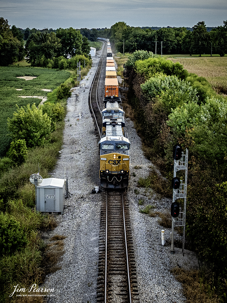 CSXT 5214 leads hot intermodal I026 past the signals at the north end of the siding at Slaughters, Kentucky at it heads north on August 27th, 2025, on the CSX Henderson Subdivision. This train runs between Moncrief Yard at Jacksonville, FL and Bedford Park, IL outside of Chicago, IL.

Tech Info: DJI Mavic 3 Classic Drone, RAW, 22mm, f/2.8, 1/1250, ISO 190

#railroad #railroads #train, #trains #railway #railway #steamtrains #railtransport #railroadengines #picturesoftrains #picturesofrailways #besttrainphotograph #bestphoto #photographyoftrains #bestsoldpicture #JimPearsonPhotography #trainsfromtheair #trainsfromadrone #onecsx #csx