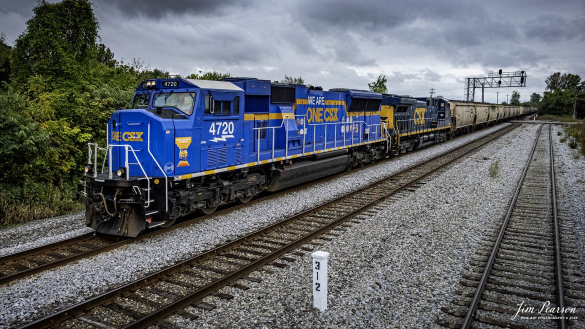 CSXT One CSX unit leads empty grain train G410 northbound past MP 312 on the CSX Henderson Subdivision on October 6th, 2025, at Henderson, Ky.

According to a CSX press release, January 14, 2025 - CSX has introduced the ONE CSX locomotive, a specially designed engine to symbolize the company’s commitment to fostering collaboration, inclusion, and mutual respect across its workforce.

“This locomotive celebrates our ONE CSX team and culture,” said CSX President and Chief Executive Officer Joe Hinrichs. “I am so proud to work with 23,000 members of our ONE CSX team every day to keep America moving.”

The locomotive’s vibrant design was created by Jody Cremeans, a Carman Painter at CSX’s mechanical shop in Huntington, West Virginia. Cremeans’ design reflects the company’s cultural pillars of valuing, appreciating, including, and respecting every individual within its organization. Employees at CSX’s Waycross, Georgia, mechanical shop brought the design to life, meticulously painting and polishing the locomotive to perfection.

Prominently displayed on the locomotive are the logos of 14 labor unions that represent CSX employees, reinforcing the company’s commitment to collaboration. This special detail of the locomotive further exemplifies CSX’s focus on working together to deliver exceptional customer service while ensuring every employee feels valued and connected.

“The ONE CSX cultural initiative has been a great way for management and craft employees to come together, to work together and to value each other,” explained Jon Guest, Assistant Superintendent at the CSX Waycross Terminal.

The ONE CSX locomotive serves as a rolling tribute to the importance of teamwork and mutual respect within the organization. For CSX, its success is directly tied to creating a workplace that fosters unity and celebrates each employee’s contributions.

The new locomotive stands as a testament to the power of shared purpose within the organization and represents CSX’s aspiration to continue building an inclusive and respectful workplace.

Tech Info: DJI Mavic Air 2S Drone, RAW, 22mm, f/2.8, 1/2500, ISO 110.

#railroad #railroads #train, #trains #railway #railway #steamtrains #railtransport #railroadengines #picturesoftrains #picturesofrailways #besttrainphotograph #bestphoto #photographyoftrains #bestsoldpicture #JimPearsonPhotography #trainsfromtheair #trainsfromadrone #onecsx #csx
