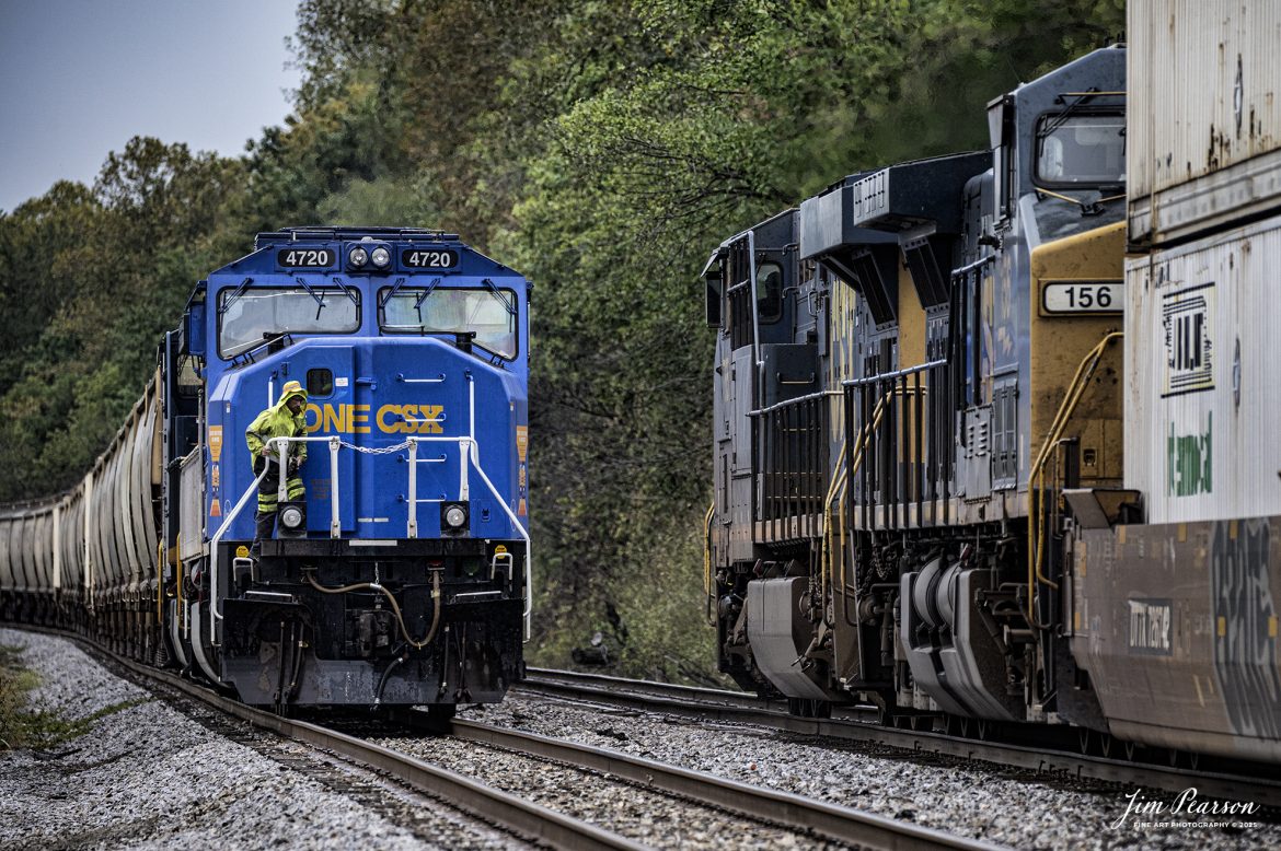 The Conductor on CSXT 4720, One CSX unit, heads down to the ground to do a roll-by inspection during a meet with CSX I195 at the north end of Slaughters, Ky, on the CSX Henderson Subdivision on October 6th, 2025.

According to a CSX press release, January 14, 2025 - CSX has introduced the ONE CSX locomotive, a specially designed engine to symbolize the company’s commitment to fostering collaboration, inclusion, and mutual respect across its workforce.

“This locomotive celebrates our ONE CSX team and culture,” said CSX President and Chief Executive Officer Joe Hinrichs. “I am so proud to work with 23,000 members of our ONE CSX team every day to keep America moving.”

The locomotive’s vibrant design was created by Jody Cremeans, a Carman Painter at CSX’s mechanical shop in Huntington, West Virginia. Cremeans’ design reflects the company’s cultural pillars of valuing, appreciating, including, and respecting every individual within its organization. Employees at CSX’s Waycross, Georgia, mechanical shop brought the design to life, meticulously painting and polishing the locomotive to perfection.

Prominently displayed on the locomotive are the logos of 14 labor unions that represent CSX employees, reinforcing the company’s commitment to collaboration. This special detail of the locomotive further exemplifies CSX’s focus on working together to deliver exceptional customer service while ensuring every employee feels valued and connected.

“The ONE CSX cultural initiative has been a great way for management and craft employees to come together, to work together and to value each other,” explained Jon Guest, Assistant Superintendent at the CSX Waycross Terminal.

The ONE CSX locomotive serves as a rolling tribute to the importance of teamwork and mutual respect within the organization. For CSX, its success is directly tied to creating a workplace that fosters unity and celebrates each employee’s contributions.

The new locomotive stands as a testament to the power of shared purpose within the organization and represents CSX’s aspiration to continue building an inclusive and respectful workplace.
Tech Info: Nikon Z6ii, RAW, Sigma 150-600 @ 320mm, f/6.3, 1/800, ISO 1,100

#railroad #railroads #train, #trains #railway #railway #steamtrains #railtransport #railroadengines #picturesoftrains #picturesofrailways #besttrainphotograph #bestphoto #photographyoftrains #bestsoldpicture #JimPearsonPhotography