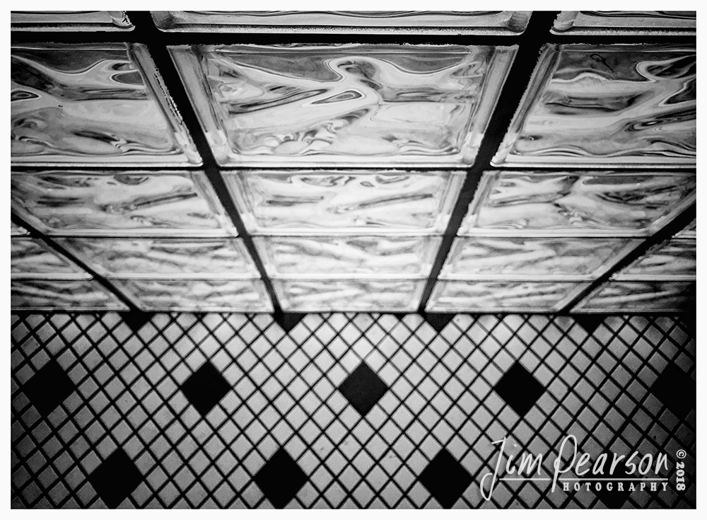 October 26, 2018 - Day 361 - iPhone 7 Plus Daily B/W Photo Challenge -- Steak and Shake! - The glass wall and patterned floor at the Stake and Shake where I stopped for lunch today at Carbondale, Illinois made for this interesting picture today.