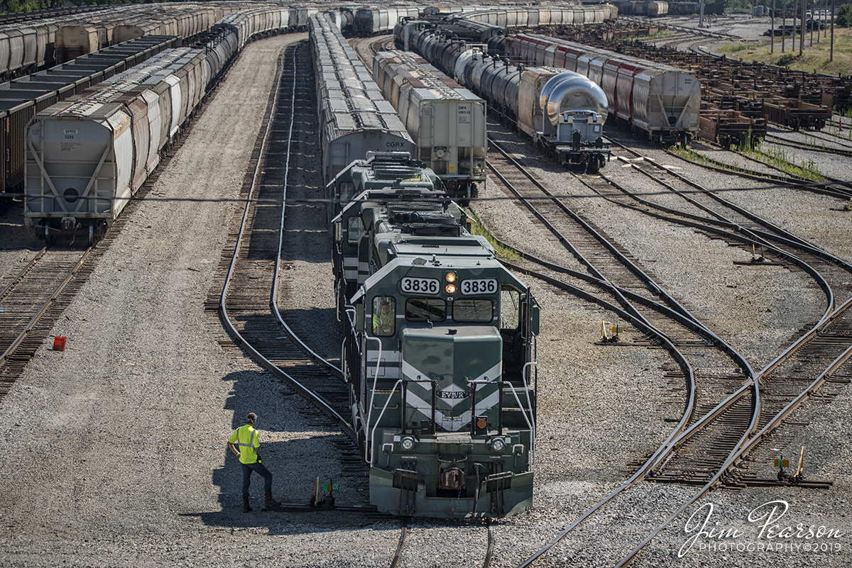 July 13, 2019 - Evansville Western 3836 heads up a local as it pulls away from a string of cars at the south end of CSX's Howell Yards as it does it's work in Evansville, Indiana.