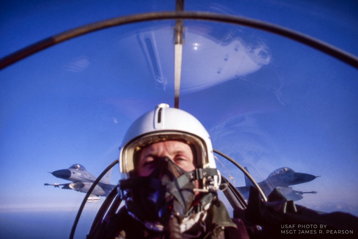 Blast From The Past - Winter 1978 - I have posted this in the past, but since Im working on images for a book on my life as a photojournalist Im adding it again. 

This is what we referred to as a High Mom shot among those of us in Combat Camera. Its where we did some of the first Selfies by putting a very wide-angle lens on the camera and then turning it towards ourselves after setting what we thought would be the correct focus. Well, I was off here a little, but its still a shot that I like because this was my first fast burner ride in the backseat of a jet!

This was over the fjords of Norway where I was shooting air to air photos of the first F-16 fighter jets that were at Boda, Norway for their first artic cold weather testing. Heres Im flying a Norwegian Fighter jets backseat. Im not totally sure but I think it was a F-106 or F-104. Its the only shot that Ive come across in my vast collection of slides.

As this was my first fighter jet ride I will admit, yes, I got sick!! LOL However, once I did so I was fine and went ahead and got the pictures! Also, I loved it, despite the rough start!! I guess this was the closest I ever came to being a Fighter Pilot! not that I ever wanted to be one. I already had what Ive always considered the best job in the world!! I have flown is and photographed a lot of different aircraft in my lifetime, but this will always be one of my most memorable!