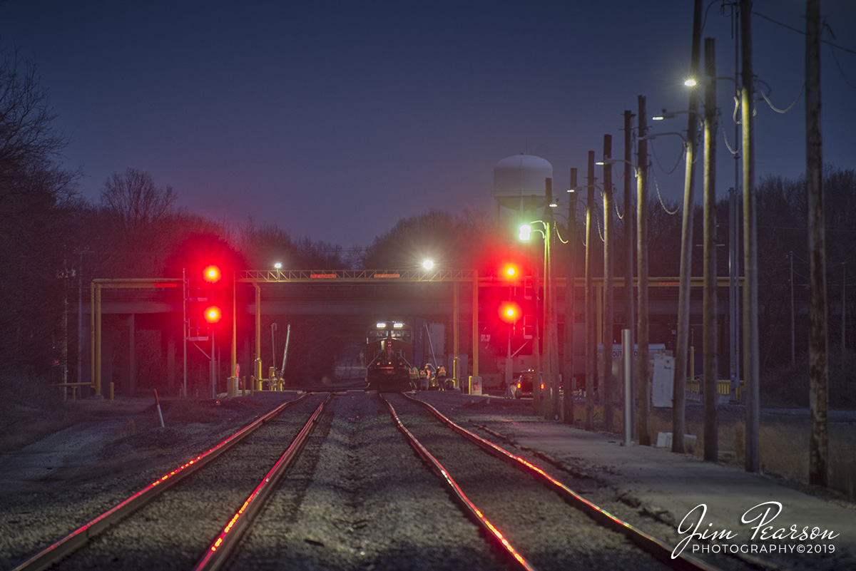 January 1, 2020 - I spent New Years Day trackside between the CN at Fulton, the CSX Memphis Subdivision and the West Tennessee Railroad (WTRR) in Jackson, Tennessee yesterday with good friend and fellow photographer Ryan Scott of IndianaRails! We had a great trip and although moving trains were pretty scarice, we had the good fortune of catching a few nice gems and knocking this shortline off our bucket list. 

We both plan on returning to chase the WTRR between Jackson and Fulton, now that we kinda have a better feel for where things are at! A big shout out to all the folks that gave us suggestions along the way! It's folks like you that help make this passion so much fun!

This photograph is of a CN intermodal as it takes on fuel at late dusk at Fulton, Kentucky before continuing on it's northbound trip on the Cario Subdivision. It was shot from a crossing with my Nikkor 70-300mm lens at 300mm. ISO was 1,000, exposure was 1/4 second at f/5.6 on a tripod. This is also just north of the Amtrak station in Fulton and so the platform helped nicely with its lighting.