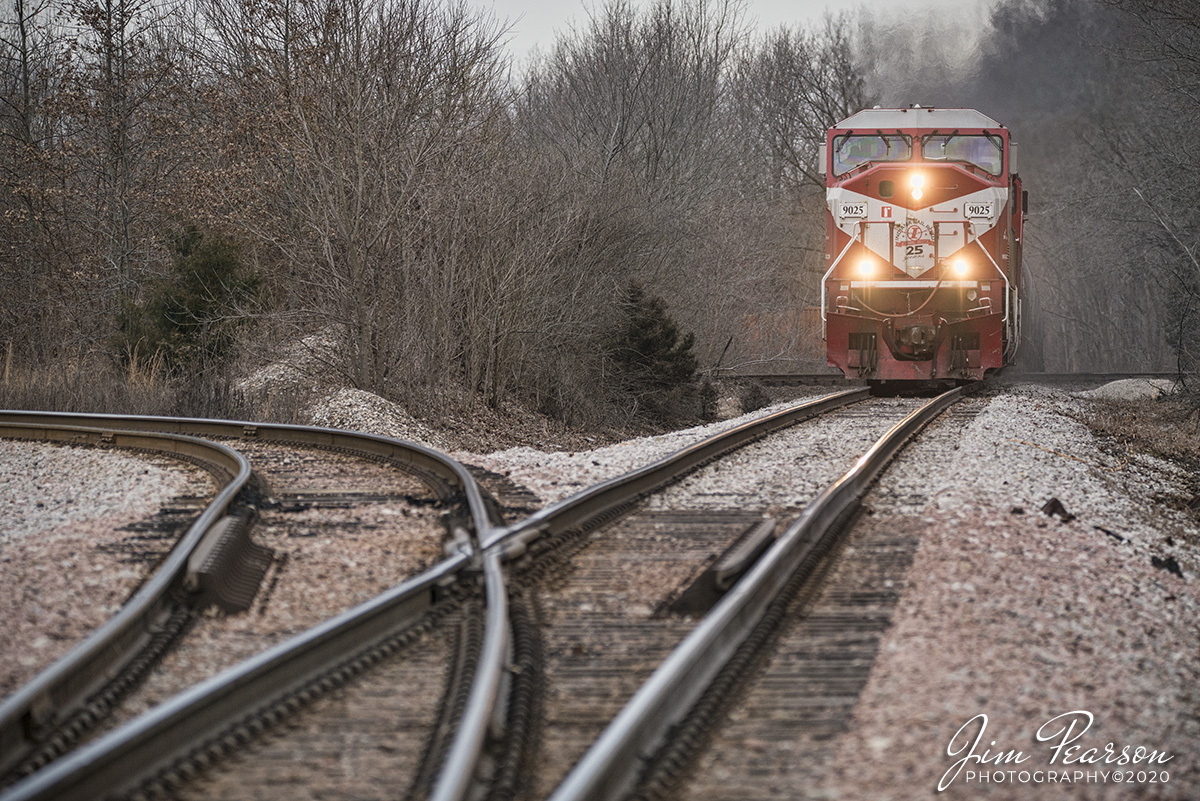 January 23, 2020 - Indiana Railroad's (INRD) 25th Anniversary locomotive 9025 leads the Hiawatha-Palestine turn HWPAT-23 as it crosses the CSX CE&D/INRD diamond at Sullivan, Indiana on it's return trip north to the INRD Hiawatha Yard at Jasonville, Indiana.

According to Wikipedia: The Indiana Rail Road (reporting mark INRD) is a United States Class II railroad, originally operating over former Illinois Central Railroad trackage from Newton, Illinois, to Indianapolis, Indiana, a distance of 155 miles (249 km). 

This line, now known as the Indiana Rail Road's Indianapolis Subdivision, comprises most of the former IC line from Indianapolis to Effingham, Illinois; Illinois Central successor Canadian National Railway retains the portion from Newton to Effingham. INRD also owns a former Milwaukee Road line from Terre Haute, Indiana, to Burns City, Indiana (site of the Crane Naval Surface Warfare Center), with trackage rights extending to Chicago, Illinois. INRD serves Louisville, Kentucky, and the Port of Indiana on the Ohio River at Jeffersonville, Indiana, through a haulage agreement with the Louisville & Indiana Railroad (LIRC).