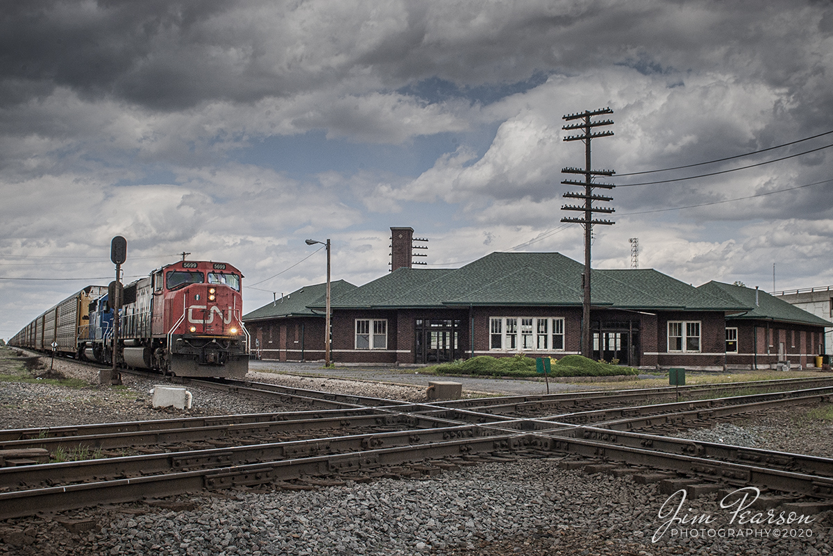 May 1, 2005 - Blast From The Past - CN 5699 leads a southbound autorack south past the depot at Effingham, Illinois as it prepares to cross the CSX/CN Diamond at the CN Champaign and St. Louis Line Subdivisions.