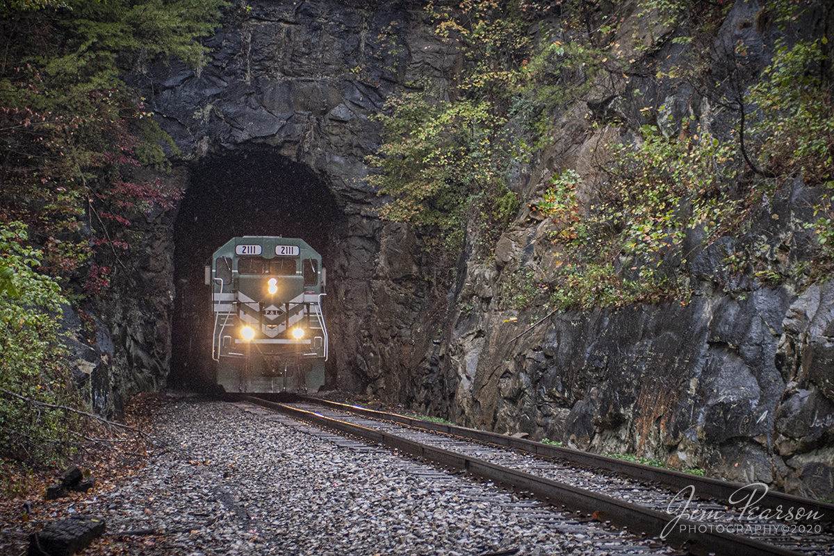 October 22, 2007 - Paducah and Louisville Railway 2111 leads the way as it exits the tunnel at Dawson Springs, Ky headed southbound towards Paducah.