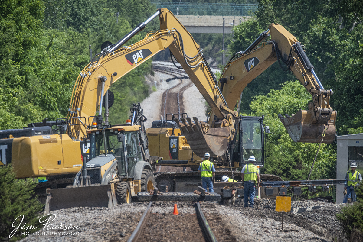 June 17. 2020 - CSX Jewelers work to replace the diamond at Trident, where the Henderson Subdivision, Morganfield Branch and the MH&E branch cross at Madisonville, Kentucky. Much of the two latter branches were shut down within the last year and are now used for storage, but locals and coal trains still use them to some degree. The Henderson subdivision however still sees on average of 20-25 trains a day so this diamond still sees a lot of traffic!

Tech Info: Nikon D800, RAW, Sigma 150-600 with a 1.4 teleconverter @ 700mm, f/13, 1/1600sec, ISO 1800.