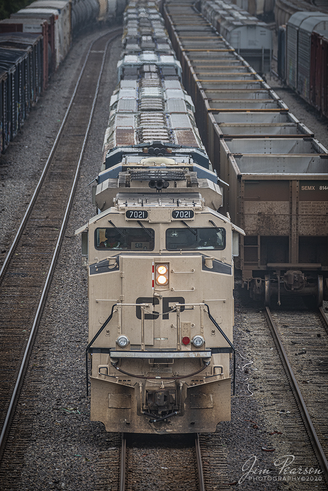 July 21, 2020 - CSX K815-19 with CP 7021 has it stopped at Howell Yard in Evansville, Indiana with a potash train, where it dropped off all its cars, changed crews and picked up a load of mixed freight before continuing it's run south on the Henderson Subdivision. This was my first catch of one of these units!

Canadian Pacific unveiled 5 of these specially painted locomotives in November of 2019 on Remembrance Day in Canada and Veterans Day in the U.S. honoring the culture and history of the armed forces. The five Electro-Motive Diesel SD70ACUs will take the message of military pride across the CP system.

CP 7020 wears North Atlantic Treaty Organization green, which the Canadian and U.S. armies apply to fighting vehicles and equipment serving in temperate climates.

CP 7021 wears the sand colour that the Canadian and U.S. armies apply to fighting vehicles and equipment serving in arid climates.

CP 7022 wears the grey, red and black colour pattern of modern Canadian and American warships.

CP 7023 wears a two-tone gray paint scheme designed after the livery applied to Canadian and American fighter jets.

CP 6644 wears the camouflage colours applied to Royal Canadian Air Force "Spitfire" fighter planes flown at the Allied invasion of Normandy, France, on June 6, 1944.

Tech Info: Full Frame Nikon D800, RAW, Sigma 150-600 @ 350mm, f/5.6, 1/500, ISO 400.