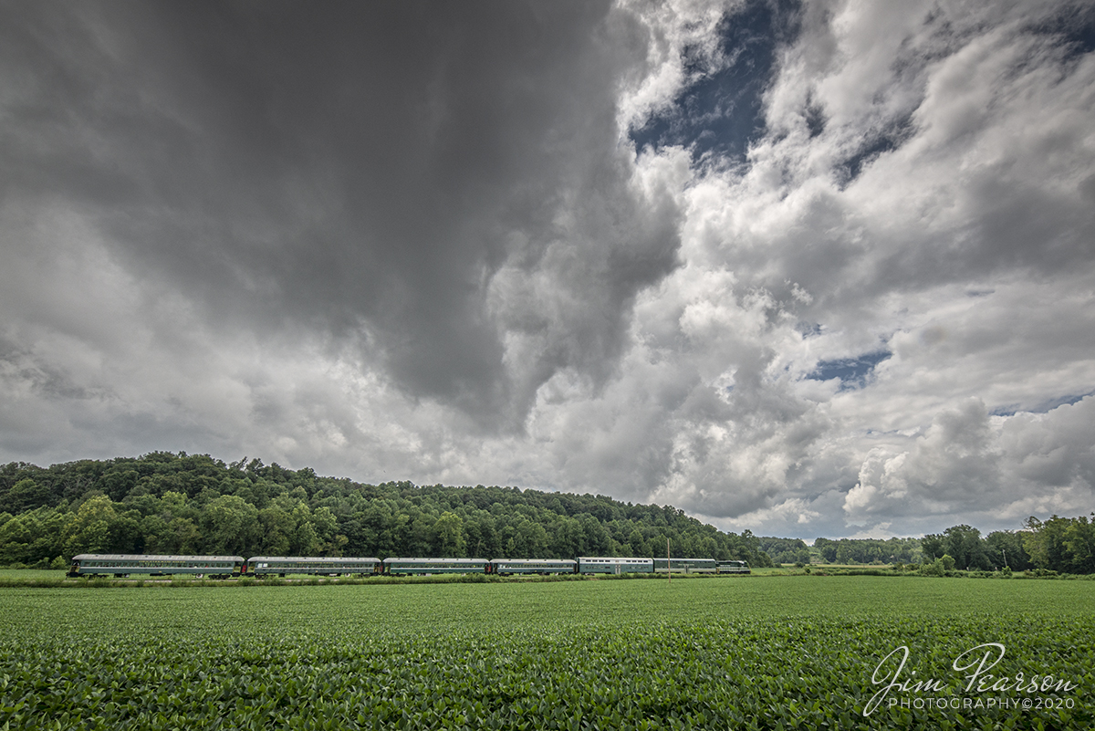 August 1, 2020 - Engine 465 leads the afternoon passenger train as it approaches the Gradman Station on the French Lick Scenic Railway under stormy skies. Despite the COVID19 restrictions the train had a good number of passengers on the train, all wearing masks and separated according the CDC guidelines. 

According to their website: The Indiana Railway Museum is a tourist railway located in French Lick, Indiana. The Museum was founded in 1961 in the town of Westport, Indiana where the railroad operated a tourist excursion, utilizing one small locomotive, three passenger cars, and about twenty volunteers. Ridership was estimated at about 500 passengers in 1962. The museum and railway remained in Westport until a move was necessitated in 1971. The organization relocated to Greensburg, Indiana where it operated until 1976 when it again, it changed locations. The Museum was relocated to French Lick in 1978 after an agreement with the Southern Railway Company. They deeded the Museum a total of sixteen miles of track stretching from West Baden, Indiana, approximately one mile north of French Lick, to a small village named Dubois, to the south.

The Indiana Railway Museum currently operates as The French Lick Scenic Railway operating passenger trains over twenty-five miles of this track from French Lick to Jasper. 

Tech Info: Full Frame Nikon D800, RAW, Irex 11mm, f/11, 1/500, ISO 220.