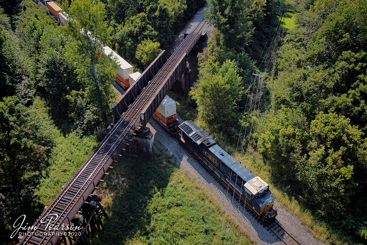 September 7, 2020 - CSXT 3350 heads up Q028-06 as it passes under the Paducah and Louisville Railway line at Monarch as it heads north on the Henderson Subdivision at Madisonville, Ky. My goal is to one day catch a train on both tracks at this spot! Now that I have a new vantage point, it will eventually happen!

Tech Info: DJI Mavic Mini Drone, JPG, 4.5mm lens, f/2.8, 1/800, ISO 100.