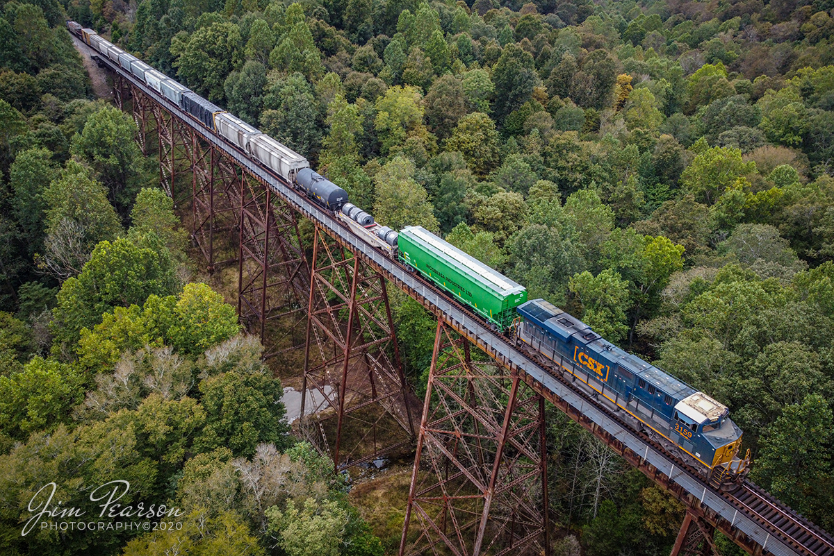 September 26, 2020 - CSXT 3159 leads Q648 (Waycross, GA - Chicago, IL) across the Gum Lick Trestle, north of Kelly, Kentucky, as it heads north on the Henderson Subdivision. 

Tech Info: DJI Mavic Mini Drone, JPG, 4.5mm (24mm equivalent lens) f/2.8, 1/400, ISO 100.
