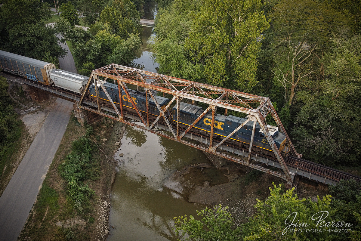September 12, 2020  CSX Q683 heads over the Patoka River at Patoka, Indiana as it heads south on the CSX CE&D Subdivision.

Tech Info: DJI Mavic Mini Drone, JPG, 4.5mm (24mm equivalent lens) f/2.8, 1/200, ISO 100.