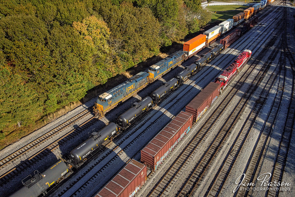 Shadows

CSX a northbound Q028-15 passes through the CSX yard at Guthrie, Ky as the RJ Corman local arrives back at Guthrie from the Memphis Line to drop off its interchange work from the day, as long shadows from the setting sun rake across the scene on the Henderson Subdivision on October 16, 2020.

#trainphotography #railroadphotography #trains #railways #dronephotography

Tech Info: DJI Mavic Mini Drone, JPG, 4.5mm (24mm equivalent lens) f/2.8, 1/1000, ISO 100.