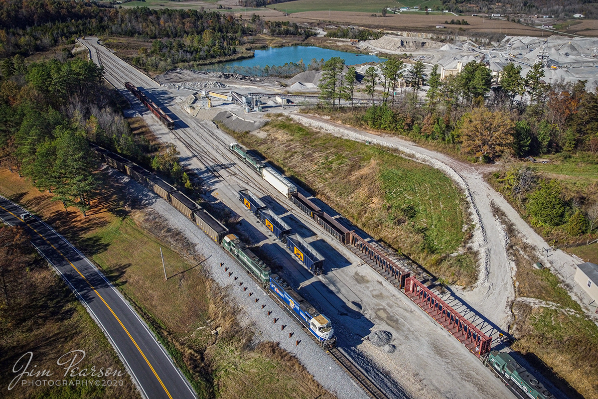 Paducah and Louisville LG1 Northbound at Litchfield, Ky

Paducah and Louisville Railway's University of Kentucky Locomotive 4522 leads LG1, a northbound Louisville Gas and Electric load of coal past Scotty's Rock Yard rail operations at Litchfield, Kentucky on October 30, 2020, where a southbound PAL local waits in their yard for it to clear.

Tech Info: DJI Mavic Mini Drone, JPG, 4.5mm (24mm equivalent lens) f/2.8, 1/1000, ISO 100.
