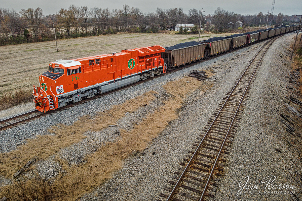 CN Elgin Joliet & Eastern Heritage Unit at Chiles Junction

Canadian National 3023, the new Elgin Joliet & Eastern Heritage unit, (EJ&E) leads loaded pet coke train U700 as it heads south on CNs Bluford subdivision at Chiles Junction in West Paducah, Ky, on November 21st, 2020.

According to a press release from CN: This is one of five locomotives representing the railways that have joined their team since their privatization, 25 years ago. Each one features the colors of the railway at the time it merged with CN as well as the logo specially created to commemorate the quarter century of our IPO. These acquisitions propelled our service farther than any other North American railway, similar to our IPO propelled CN to new heights. The engines release so far are BC Rail; Grand Trunk West; CN; Illinois Central; Wisconsin Central; and Elgin, Joliet & Eastern.

Tech Info: DJI Mavic Mini Drone, JPG, 4.5mm (24mm equivalent lens) f/2.8, 1/240, ISO 200.