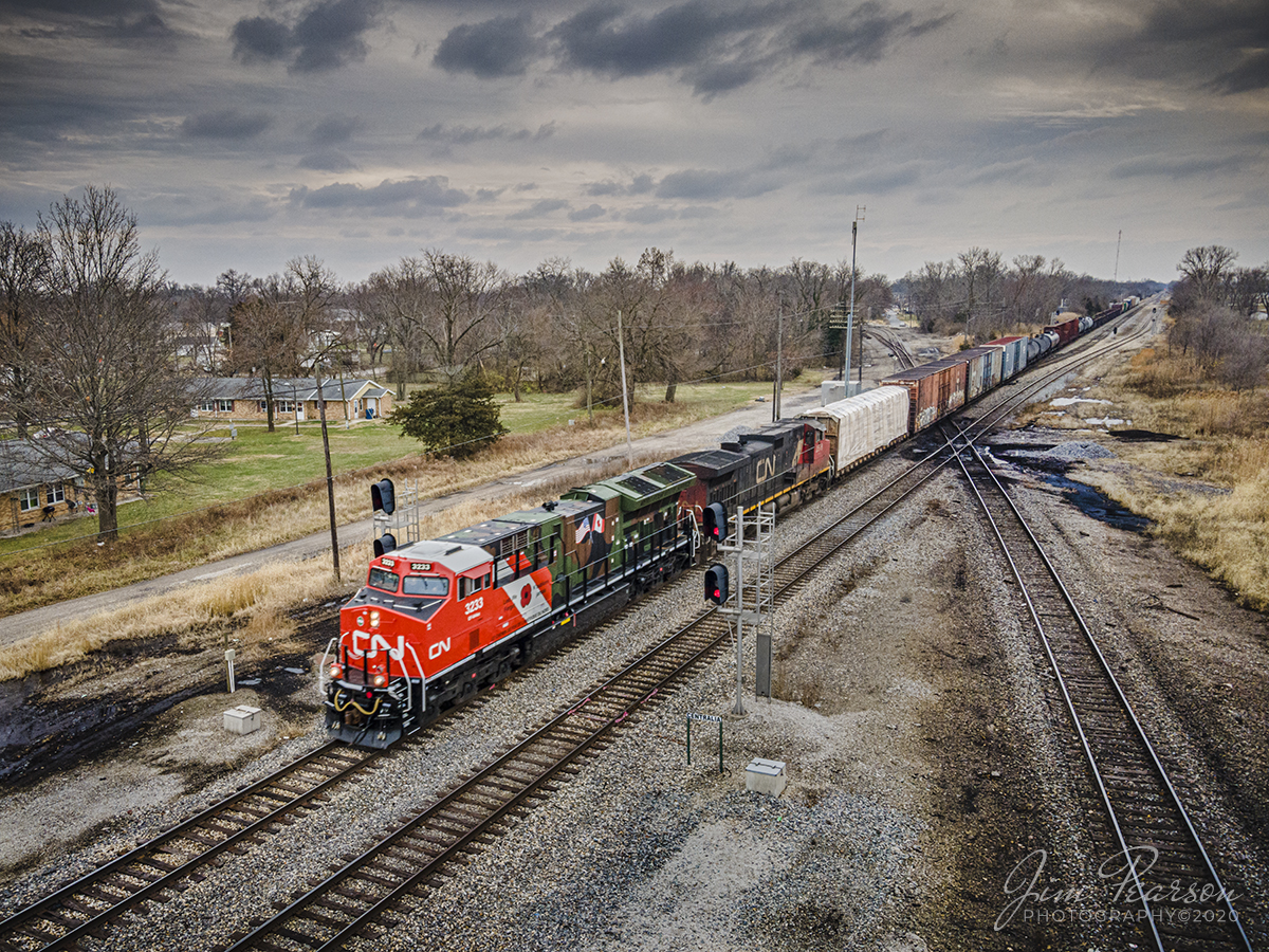 Canadian National Support our Troops engine at Centralia, IL

Canadian National (CN) locomotive 3233 (Support our Troops) heads north on the CN Centralia Subdivision leading CN M396 passes through the diamonds at Centralia, Illinois on December 15th, 2020.

Tech Info: DJI Mavic Air 2 Drone, JPG, 4.5mm (24mm equivalent lens) f/2.8, 1/500, ISO 100.