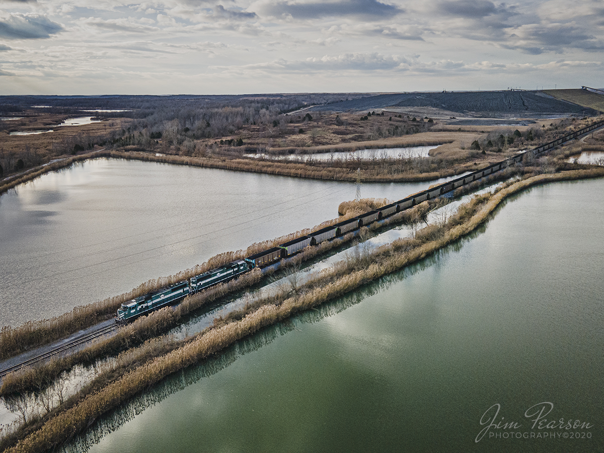 Paducah and Louisville load of coal southbound on a winter's day

A loaded Paducah and Louisville coal train pulls south out of Warrior Coal Mine at Nebo, Kentucky, as it starts its run to Calvert City Terminal in Calvert City, Kentucky on a cold December 11th, 2020.

Tech Info: DJI Mavic Air 2 Drone, RAW, 4.5mm (24mm equivalent lens) f/2.8, 1/500, ISO 100.