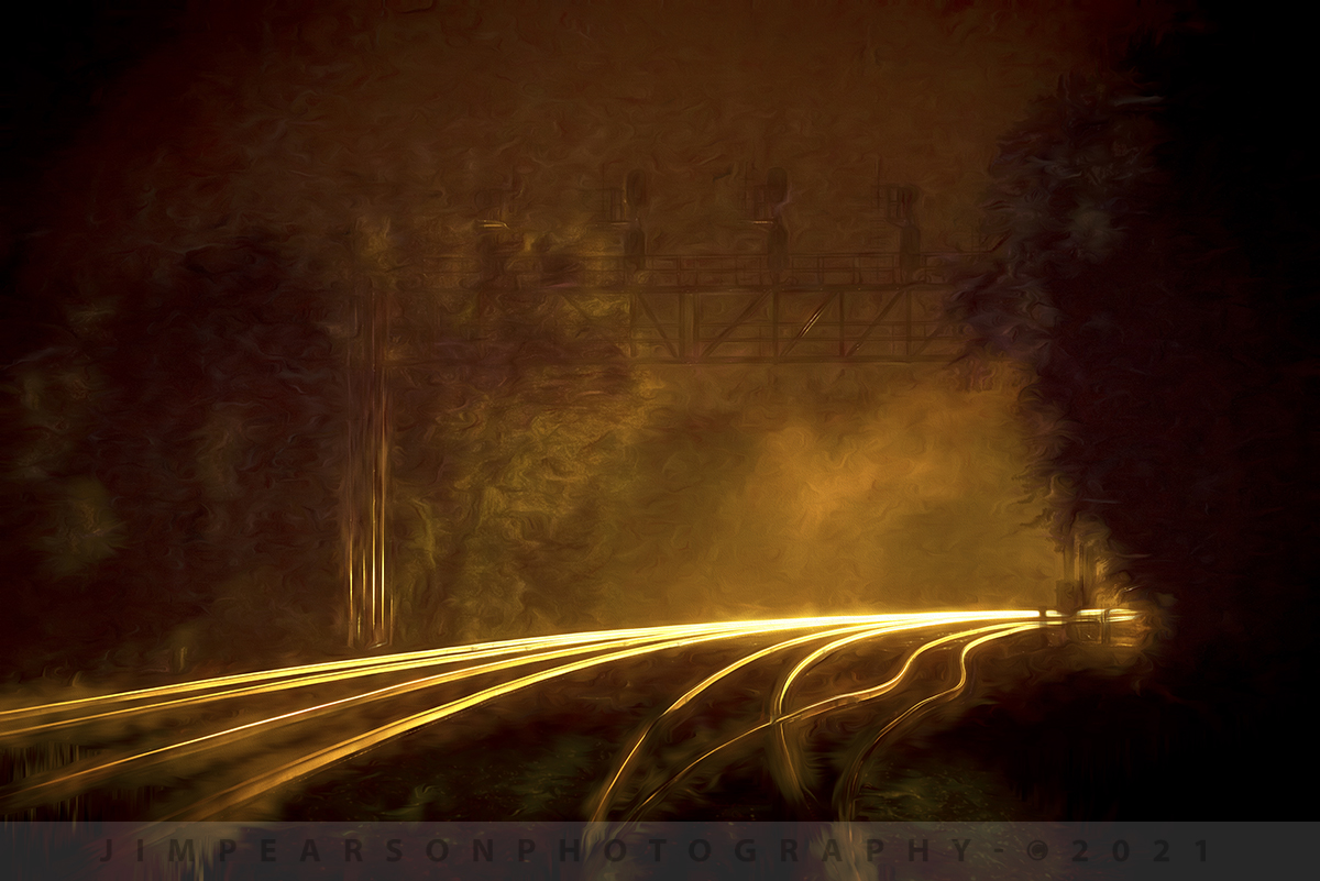 August 1, 2020 - It's a hot and steamy summer night as the headlights of CSX Q513 illuminates the tracks at the south end of Howell Yard in Evansville, Indiana as it makes a pickup before continues its way south along the Henderson Subdivision.

Tech Info: Nikon D800, RAW, Nikkor 70-300 @112mm, f/4.8, 1/30, ISO 3,200.