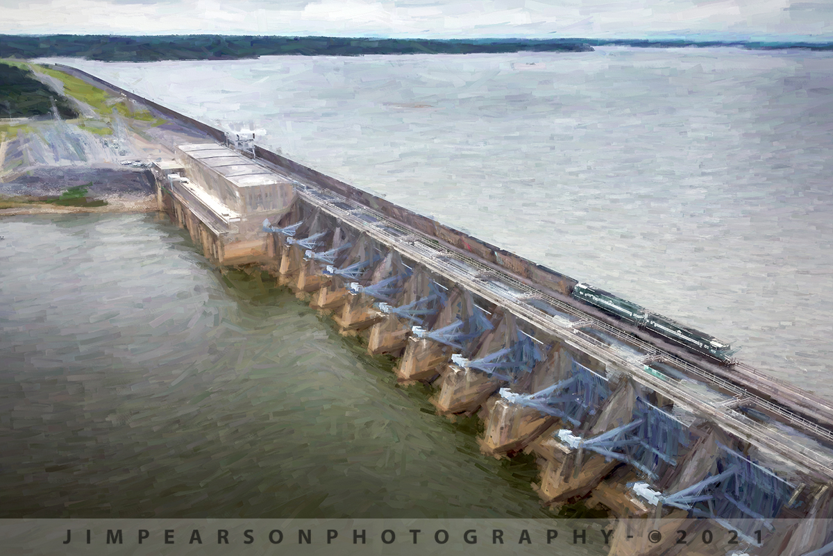 September 24, 2020 - Paducah & Louisville (PAL) 4512 and Evansville Western 4511 lead a 5,400ft loaded coal train across Barkley Dam at Grand Rivers, Kentucky on the Cumberland River, as they head for the Calvert City Coal Terminal at Calvert City, Ky.

Barkley Dam construction along with Kentucky Dam formed the Land Between the Lakes National Recreation Area by stopping the flow of the Cumberland and Tennessee Rivers, forming Lake Barkley and Kentucky Lake respectively and the PAL mainline runs right across the dam.

Tech Info: DJI Mavic Mini Drone, JPG, 4.5mm (24mm equivalent lens) f/2.8, 1/320, ISO 100.