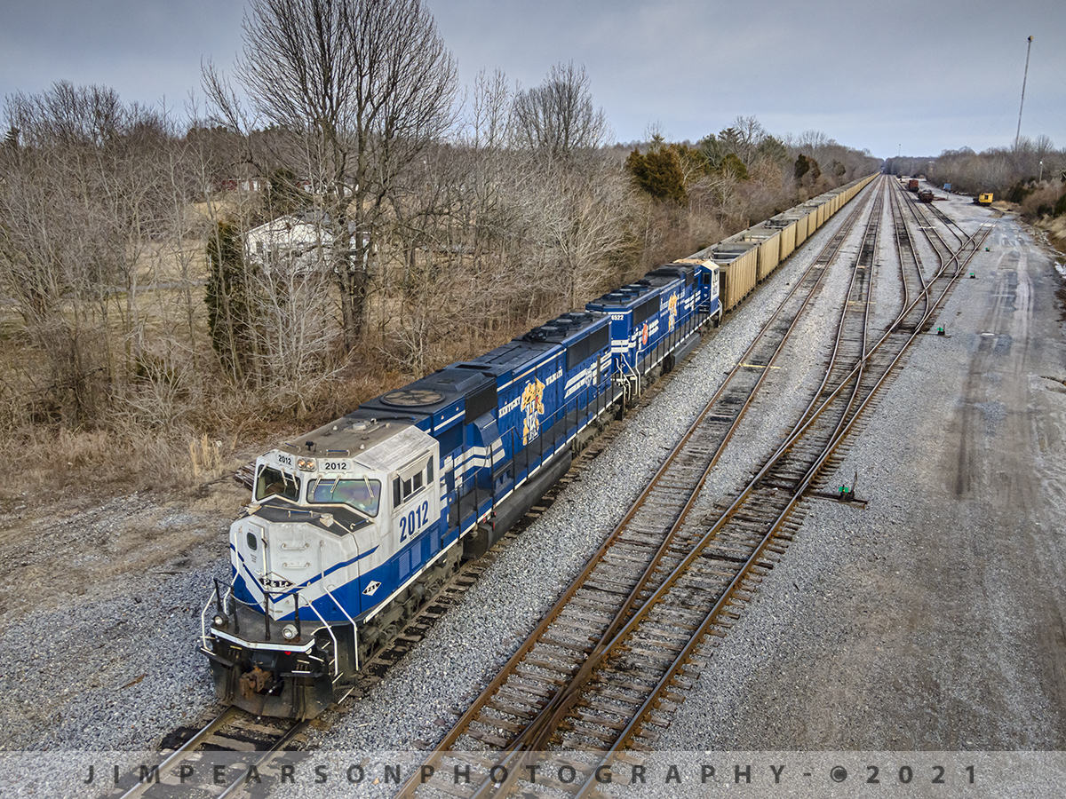 Waiting for a fresh crew

Paducah and Louisville Railways (PAL) two University of Kentucky engines (SD70MACs) 2012 and 4522 sit tied down on the main at West Yard in Madisonville, Kentucky on February 6th, 2021.

They are leading a empty coal train for the Louisville Gas and Electric power plant outside of Louisville, Kentucky and are waiting on a fresh crew to take the train onto the Warrior Coal Mine loop at Nebo, Ky for another load of coal.

This engine pair has been traveling on this turn for a couple weeks now and always makes for a nice picture!

#trainphotography #railroadphotography #trains #railways #dronephotography #jimpearsonphotography 

Tech Info: DJI Mavic Air 2 Drone, RAW, 4.5mm (24mm equivalent lens) f/2.8, 1/640, ISO 100.