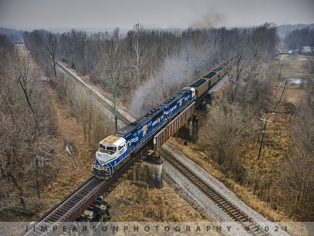 Northbound load of coal at Monarch, Madisonville, Ky

Paducah and Louisville Railways (PAL) University of Kentucky engines (SD70MACs) 4522 and 2012 power their way north as they cross over the CSX Mainline on the Henderson Subdivision, at the location known as Monarch, in Madisonville, Kentucky on February 9th, 2021.

They are leading a empty coal train for the Louisville Gas and Electric power plant outside of Louisville, Kentucky, after picking up a load of coal the Warrior Coal Mine in Nebo, Ky.

This engine pair has been traveling on this turn for a couple weeks now and always makes for a nice picture!

Tech Info: DJI Mavic Air 2 Drone, RAW, 4.5mm (24mm equivalent lens) f/2.8, 1/800, ISO 100.