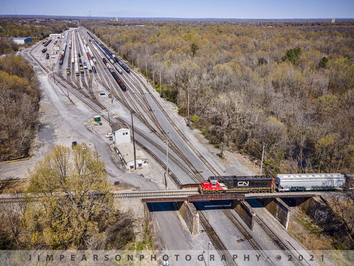 Signs of Spring at the Paducah and Louisville Railway as CN heads to Fulton, Ky!


With signs of spring in the trees, Canadian National Fulton to Paducah (FUPU) turn heads over the Paducah and Louisville Railway yard as it heads back to Fulton, Ky after making its drop-off and pick-up at Paducah, Ky.

I've been trying to catch this shot ever since I got my first drone and it finally happened today, April 3rd, 2021st while myself and fellow railfan Ryan Scott spent the day chasing trains around Paducah and Fulton, Ky! While we didn't get a lot of trains, what we did catch was nice and you'll see more in the days to come!


Tech Info: DJI Mavic Air 2 Drone, RAW, 4.5mm (24mm equivalent lens) f/2.8, 1/800, ISO 100.