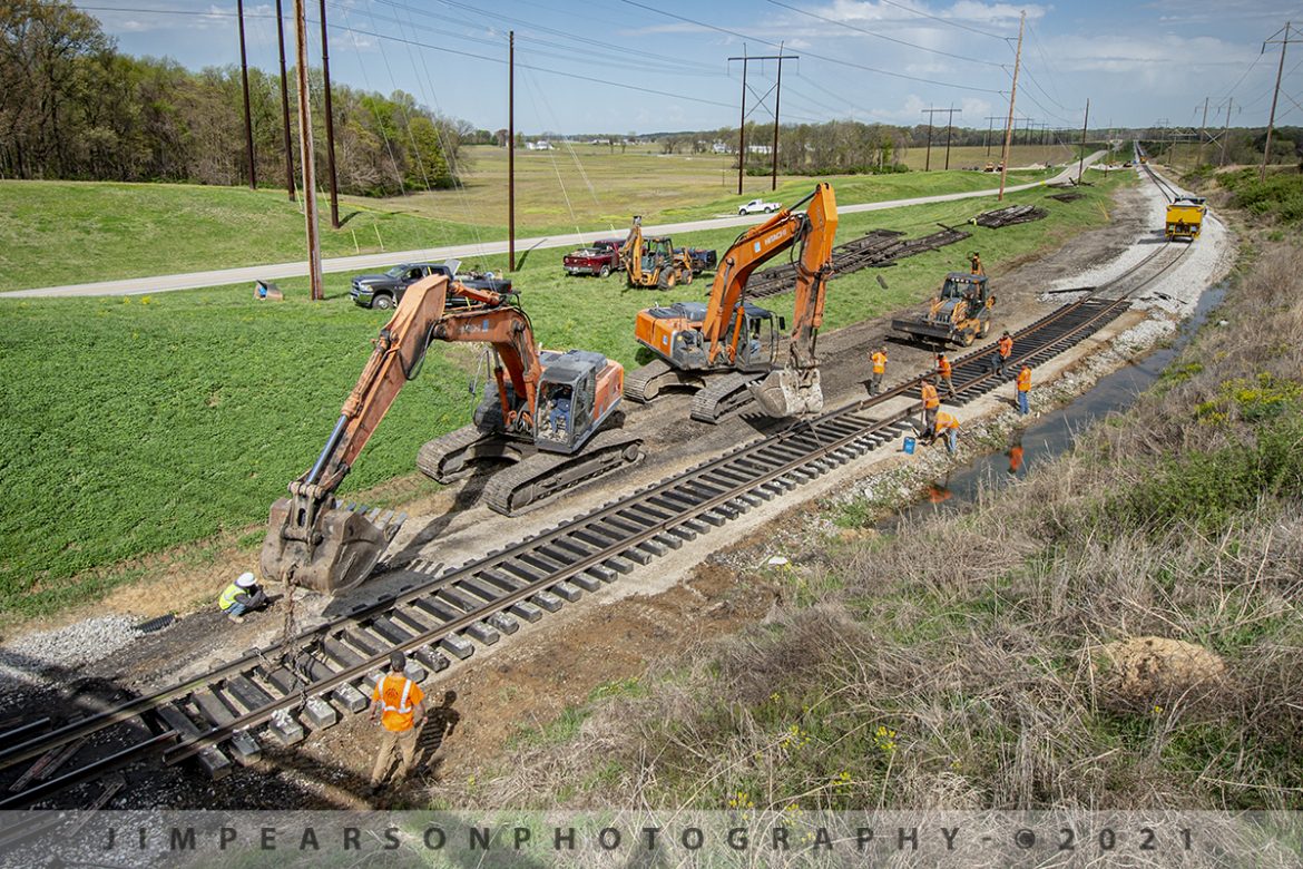 Modern-Day Gandy Dancers

Today while out railfanning with fellow rail enthusiast and Facebook follower, Gary Winsett, we ran by the AB Brown power plant at West Franklin, Indiana to see if they were any trains there to catch and stumbled upon track crews from Alltrack Inc, working on placing a new track panel on the lead going into the power plant.

We were fortunate enough to get there just in time for me to grab this shot on April 9th, 2021 of the crew working a new section of track in place right before the overpass on Lower Mt. Vernon Road, in a great spot for photographing these modern-day Gandy Dancers at work.

According to Wikipedia: Gandy dancer is a slang term used for early railroad workers in the United States, more formally referred to as "section hands", who laid and maintained railroad tracks in the years before the work was done by machines. 

According to their website: Alltrack Inc. was established in March of 1988 by Lee Clark, Lester Binegar, and Robert Butler to perform railroad construction and maintenance work in the Indiana area.  In January of 1998 Jim & Jon Lawyer bought the business and later moved their operations to Pendleton, IN.  Alltrack Inc. has grown in recent years to service the entire Midwest & parts of the South.

Tech Info: Nikon D800, RAW, Nikon 10-14mm @10mm, f/5, 1/1000, ISO 180.