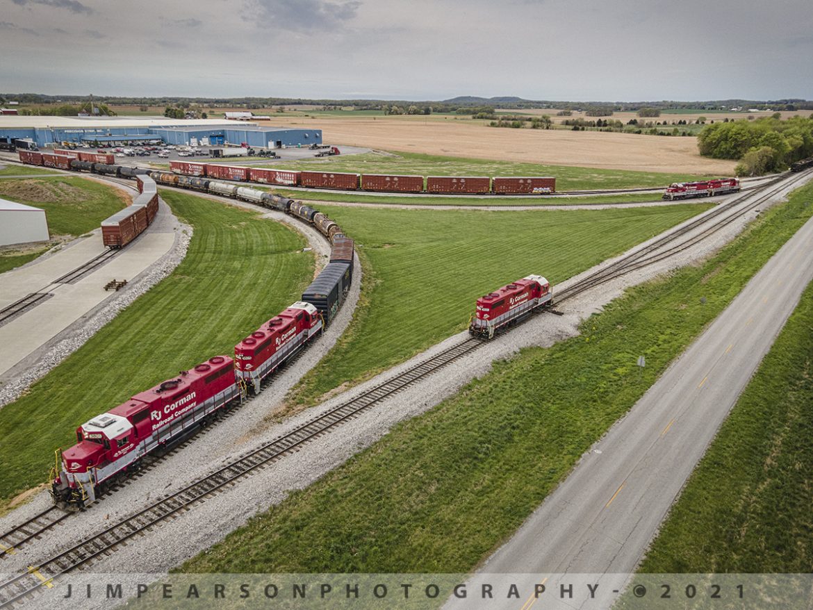 RJ Corman Wye Work at Woodburn, Ky

Fellow railfan Cooper Smith and I really lucked out when we railfanned the RJ Corman Memphis line on April 14th, 2021. We caught the northbound RJC ML25 at South Union, Kentucky and chased it up to the RJ Corman Distribution Center at Woodburn, Ky.

After dropping their power on the wye and pulling one unit off they moved it on north and I got this shot of it just passing the switch before it was put in the track on the right! The train on the left then came out on the main and backed down on the main to pickup the cars and it continued north as MR25 to Louisville.

Tech Info: DJI Mavic Air 2 Drone, RAW, 4.5mm (24mm equivalent lens) f/2.8, 1/640, ISO 100.