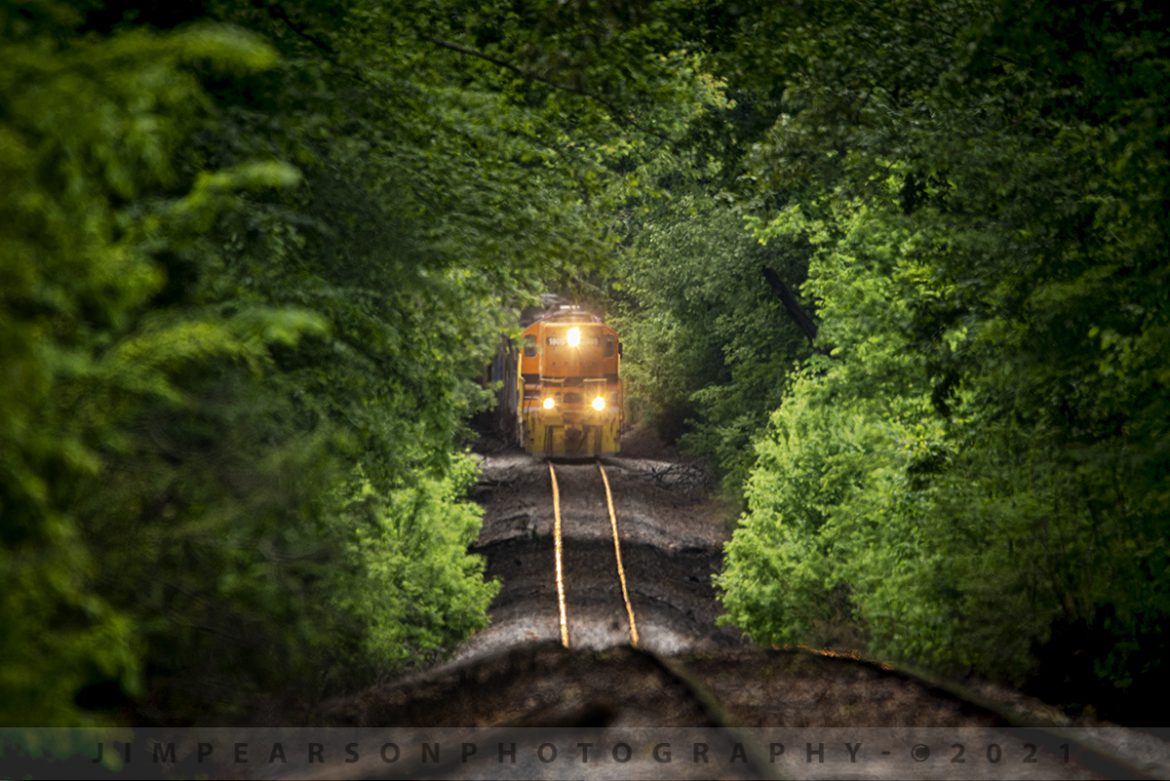 Kentucky-West Tennessee Railway 1809 and 304 depart Dresden, TN

Today was my first ever catch of this shortline railroad, the Kentucky-West Tennessee (KWT) Railway. Here we find Z978 as it pulls through a tunnel of trees and undulating tracks as it departs Dresden, Tennessee on May 10th, 2021 on the KWT's run between Dresden and McKenzie, Tennessee.

The KWT is owned by the Genesee & Wyoming Railroad who owns or leases 116 railroads across North America, the United Kingdom and Europe. The KWT Owns or leases 72 miles of track between Kentucky and Tennessee and interchanges with the CSX at Bruceton, TN. It was bought by the Genesee & Wyoming Railroad in 2005.

Tech Info: Nikon D800, RAW, Sigma 150-600mm with a 1.4 teleconverter @ 850mm, f/9, 1/500, ISO 900.