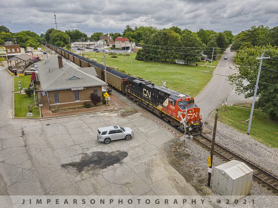 Canadian National loaded coke train U70091-28 southbound at Newbern, TN

CN loaded coke train U70091-28 heads southbound on the Fulton Subdivision, with engineer Darren Doss at the controls of CN 3868 on May 29th, 2021 as it passes the Amtrak station southbound through downtown Newbern, TN,.

Tech Info: DJI Mavic Air 2 Drone, RAW, 4.5mm (24mm equivalent lens) f/2.8, 1/640, ISO 100.