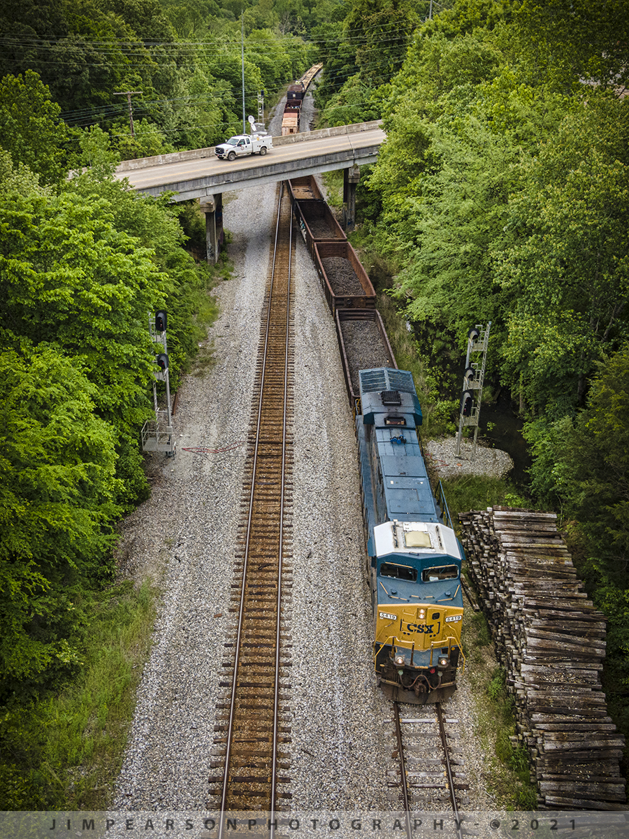 CSX J056 southbound takes the siding at Camden, TN

CSXT 5419 heads up work train J056 as pulls into the siding at Camden, Tennessee as it makes its way south on the CSX Bruceton Subdivision, passing under the Forrest Avenue overpass.

The Bruceton Subdivision is owned by CSX Transportation and runs from Nashville, Tennessee, to Camden, Tennessee, for a total of 87.7 miles (141.1 km). At its east end the line continues west from the Nashville Terminal Subdivision and at its west end the line continues west as the Memphis Subdivision.

Tech Info: DJI Mavic Air 2 Drone, RAW, 4.5mm (24mm equivalent lens) f/2.8, 1/400, ISO 100.