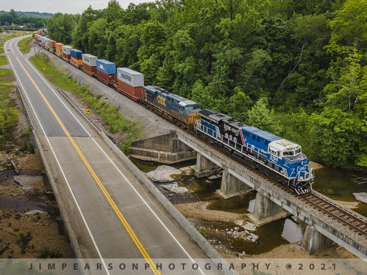 CSXT 3194 Spirit of our Law Enforcement unit eastbound at Trace Creek, Waverly, Tennessee

CSXT 3194 (Spirit of our Law Enforcement) crosses over Trace Creek as it makes its way through the hills of Tennessee, at Waverly, TN, as it led Q125-05 (Memphis, TN - East Savannah, GA) east on the CSX Bruceton Subdivision. 

From CSX Press Releases - CSX Transportation's "Spirit of our Law Enforcement" commemorative locomotive CSXT 3194 is being renamed to honor our nation's police officers who dedicate their lives to serve and protect communities across our network.

CSXT 3194 is painted primarily in black, blue and white, with the slogans "To Protect and Serve" and "Honoring Our Law Enforcement." It also prominently features the CSX Transportation Railroad Police logo, as well as police, fire and emergency responder logos.

Tech Info: DJI Mavic Air 2 Drone, RAW, 4.5mm (24mm equivalent lens) f/2.8, 1/320, ISO 100.