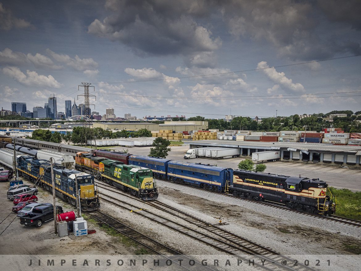 Tennessee Moonshine Sippin' Excursion Train Departs Nashville, TN

The Tennessee Moonshine Sippin' Excursion Train departs from the Tennessee Central Railway Museum (TCRX), which operates out of Nashville, TN, on June 12th, 2021 with downtown Nashville in the distance. Here we find L&;N 405 leading the train as it passes the Nashville & Eastern Railroad where myself and fellow railfan Ryan Scott, of Steelrails, caught our first shots while chasing this train from Nashville to Watertown, TN and back, along the Nashville, and Eastern Railway line. 

Once restoration is complete Nashville Steam's Nashville, Chattanooga & St. Louis Railway steam locomotive No. 576 will lead trains along this same route! The rest of the power in the consist was L&N F7B 715 & 719, plus TCRX E8A 6902 trailing which led on the return trip.

According to their website: The Tennessee Central Railway Museum is a volunteer, non-profit organization. Our mission is to preserve, restore, interpret, and operate historic railroad equipment to educate our guests about America's railroads.

Since 1989, TCRM has been running passenger excursions from Nashville to points east such as Lebanon, Watertown, Baxter, Cookeville, and Monterey, Tennessee. 

Tech Info: DJI Mavic Air 2 Drone, RAW, 4.5mm (24mm equivalent lens) f/2.8, 1/800, ISO 100.