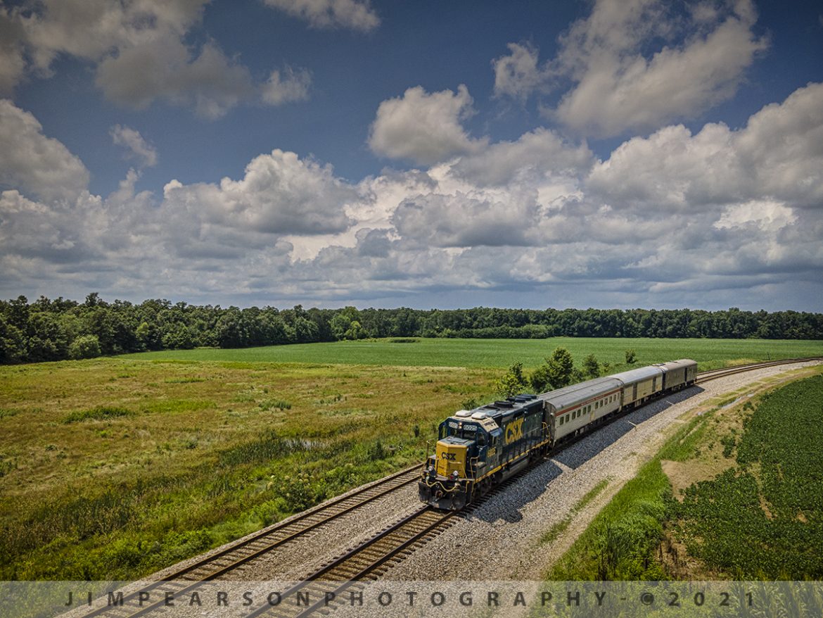 CSX Track Inspection trainset W001 at Breton, KY

CSXT 6025 leads CSX W001 as it passes through Breton, Kentucky, southbound with Southern Pacific Birch Grove, CSX Florence and TGC2 Geometry Car, as they make their way down the Henderson Subdivision on July 13, 2021.

According to Wikipedia: A track geometry car (also known as a track recording car) is an automated track inspection vehicle on a rail transport system used to test several parameters of the track geometry without obstructing normal railroad operations. Some of the parameters generally measured include position, curvature, alignment of the track, smoothness, and the cross level of the two rails. The cars use a variety of sensors, measuring systems, and data management systems to create a profile of the track being inspected.

One of the earliest track geometry cars was Car T2 used by the U.S. Department of Transportation's Project HISTEP (High-Speed Train Evaluation Program). It was built by the Budd Company for Project HISTEP to evaluate track conditions between Trenton and New Brunswick, NJ, where the DOT had established a section of track for testing high-speed trains, and accordingly, the T2 ran at 150 miles per hour or faster.

Tech Info: DJI Mavic Air 2 Drone, RAW, 4.5mm (24mm equivalent lens) f/2.8, 1/1250, ISO 100.