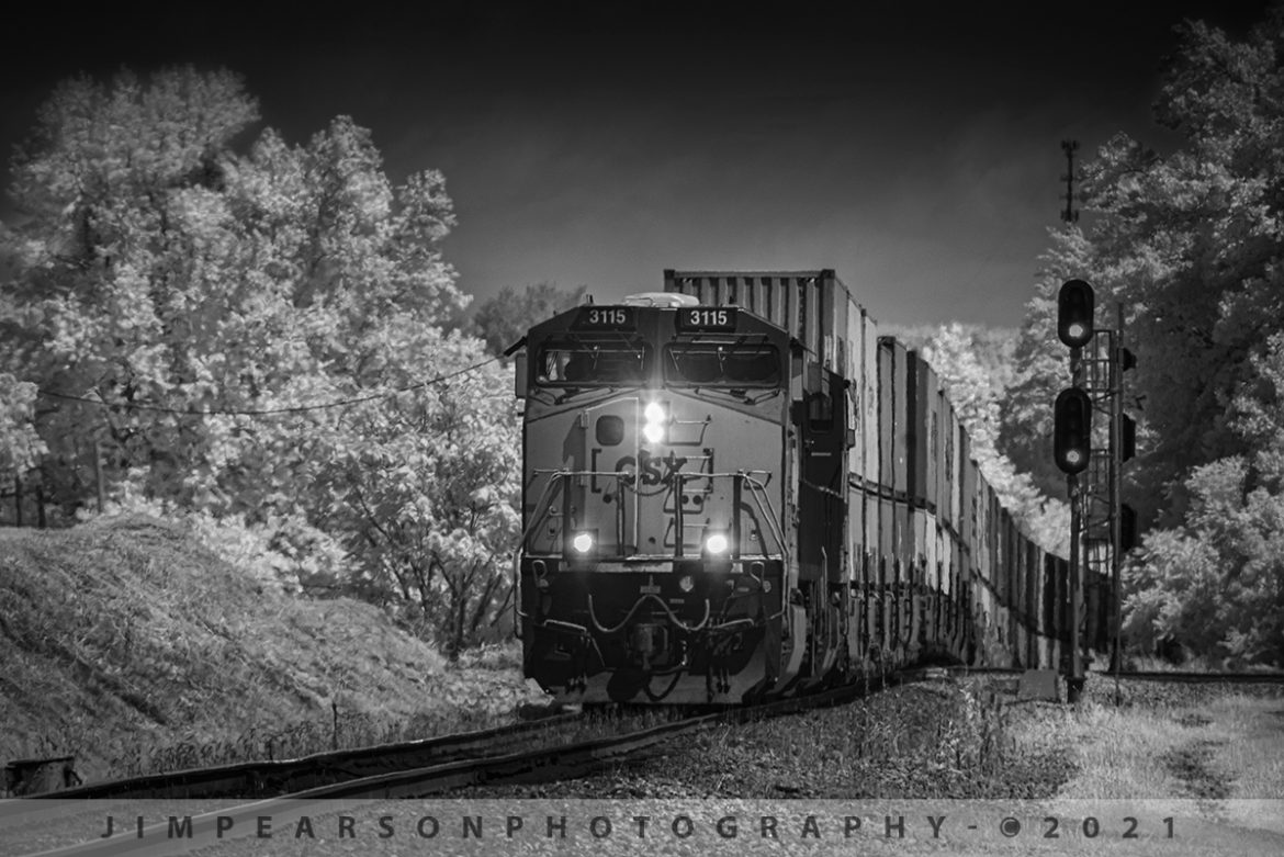 CSXT 3115 pulls upgrade leading Q025 at Mortons Gap, KY

CSX Q025 pulls up grade out of the valley with CSXT 3115 leading the way at Mortons Junction on the Henderson Subdivision as it heads south at Mortons Gap, KY in this infrared shot on July 16th, 2021 with over two miles of containers trailing behind.

Tech Info: Fuji XT-1, RAW, Converted to 720nm B&W IR, Sigma 150-600 @ 300mm, f/8, 1/500, ISO 400.