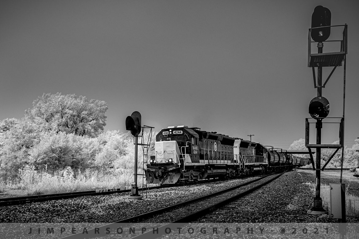 Decatur & Eastern Railroad eastbound at Tuscola, Illinois

Decatur & Eastern Illinois Railroad units WAMX 4244 and 4234 lead local 101 on its way to Terre Haute, Indiana as it passes through Tuscola, Illinois.

According to Wikipedia: "The Decatur & Eastern Illinois Railroad (reporting mark DREI) is an American regional railroad that is a subsidiary of Watco operating in eastern Illinois and western Indiana.

In January 2018, CSX Transportation announced that it was seeking offers to buy the Decatur Subdivision and the Danville Secondary Subdivision as part of a system-wide sale of low-traffic routes, and in July, Watco, via the DREI, was identified as the winning bidder. Following regulatory approval from the Surface Transportation Board, The DREI began operations on September 9, 2018

The DREI operates two intersecting routes totaling 126.7 miles (203.9 km)the former Decatur Subdivision between Montezuma, Indiana and Decatur, Illinois, and the former Danville Subdivision between Terre Haute, Indiana and Olivet, Illinois. It interchanges traffic with CSX, the Eastern Illinois Railroad, the Norfolk Southern Railway, the Canadian National Railway, and the Union Pacific Railroad. The railroad is headquartered in Decatur, Illinois."

Tech Info: Fuji XT-1, RAW, sensor converted to 720nm B&W IR, Fuji 18-55 @21mm, f/5, 1/250, ISO 200, July 20, 2021.

#jimpearsonphotography #infraredphotography #irphotography