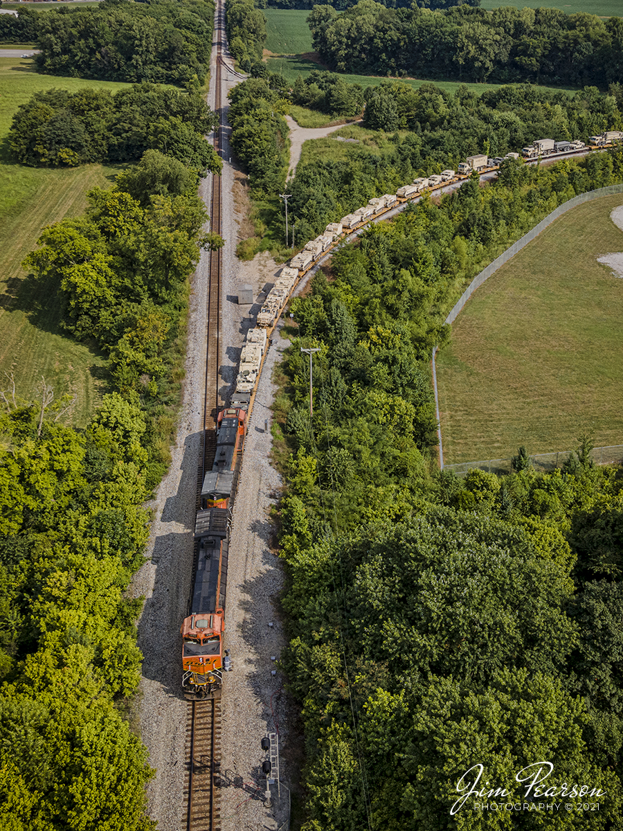 CSX W844 military train backs onto the Ft. Campbell Wye at Hopkinsville, KY

BNSF 5103 and 4653 lead CSX W844-05 military train (Memphis, TN-Hopkinsville, KY) as they shove their loads onto the Ft Campbell wye at Hopkinsville, KY, from the Henderson Subdivision, for the final part of their journey on August 7th, 2021.

The crews from Ft. Campbell had already come out to the wye earlier in the day and picked up another loaded train that was dropped off overnight and my guess is that this train probably won't set on the wye very long either.

Tech Info: DJI Mavic Air 2 Drone, RAW, 4.5mm (24mm equivalent lens) f/2.8, 1/500, ISO 100.