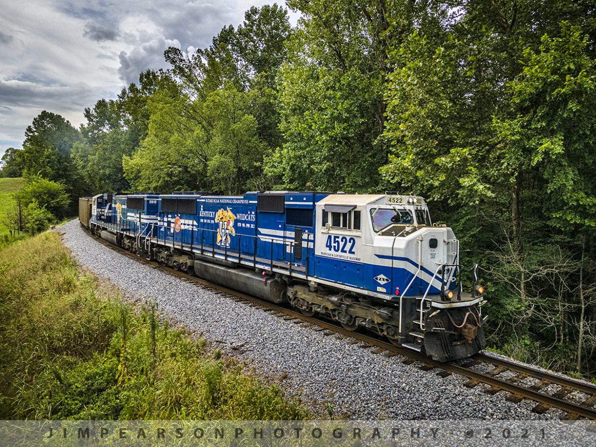 PAL LG1 loaded coal headed north approaching Rockport, Kentucky

Paducah and Louisville University of Kentucky locomotives 4522 and 2012 lead the Louisville Gas & Electric loaded coal train north as they round a curve leading into Rockport, Kentucky, on its way to the Louisville Gas and Electric power plant in the Kosmosdale neighborhood of Louisville, Kentucky.

Tech Info: Wide Photo: DJI Mavic Air 2 Drone, RAW, 4.5mm (24mm equivalent lens) f/2.8, 1/640, ISO 100, August 17, 2021. 

#trainphotography #railroadphotography #trains #railways #dronephotography #jimpearsonphotography